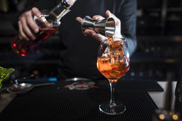 Man working at cocktail bar