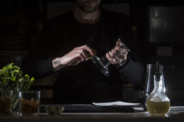 Man working at cocktail bar