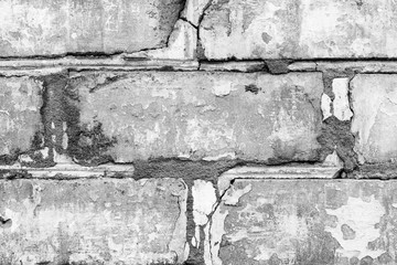 Fototapeta premium Brick texture with scratches and cracks