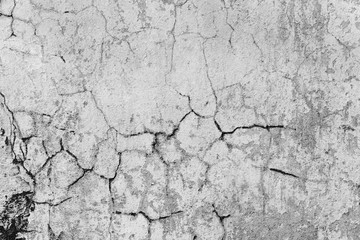 Wall fragment with scratches and cracks