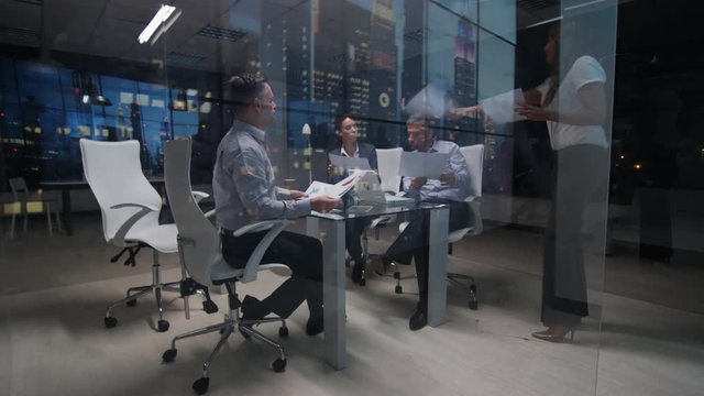  Time lapse corporate business team working late in city office
