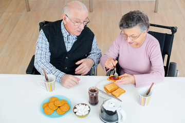senior couple having breakfast