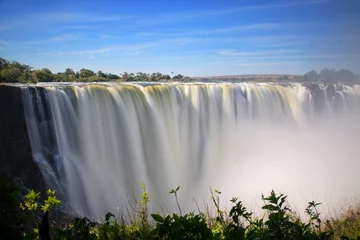 Foto op Plexiglas Victoriawatervallen vanuit Zimbabwe © yurybirukov