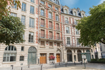 Fototapeta na wymiar Paris, place Dauphine, beautiful place and public square, parisian facades 