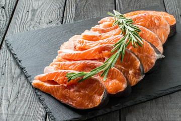 Fresh salmon sliced on steaks
