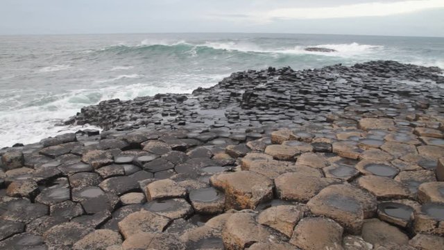 The Giant`s Causeway, made up of 40,000 interlocking basalt columns, the result of an ancient volcanic eruption in Bushmills, County Antrim, Northern Ireland.