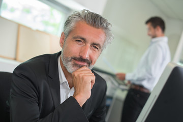 smiling mature male office worker