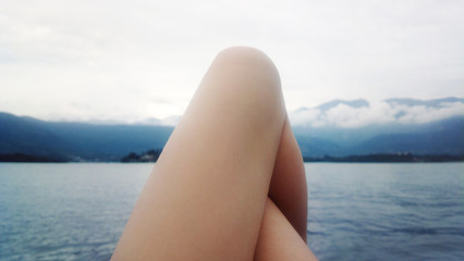 legs at the sea