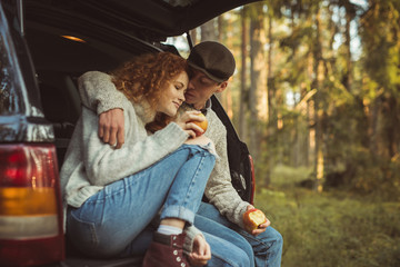 Love story. Couple relaxing in wild forest