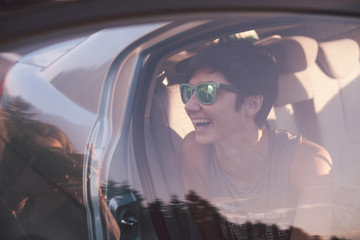 girl smiling in the car