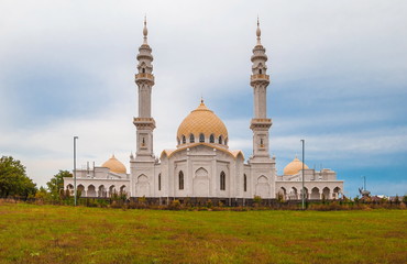 Moslem white mosque with minarets