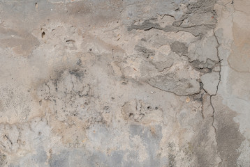 old plaster wall, chipped paint, grey texture, background