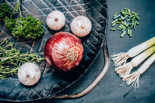 Cooking Ingredients Presented in a Wrought-Iron  Skillet