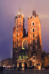 Market square in Cracow at night with St. Mary's Basilica