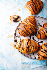   Breakfast Continental  with Fresh  Croissants with Chocolate and sauce on a blue Background  Delicious Baking Top View Copy space for Text