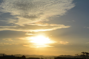 Dusk with sunset and blue sky