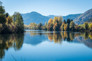 Fototapeta premium Idyllic view of river Mur on a day in autumn, Styria, Austria