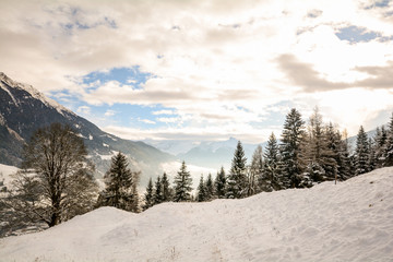Fototapeta premium View to a winter landscape with mountain range of Gasteinertal valley near Bad Gastein, Pongau Alps - Salzburg Austria Europe 