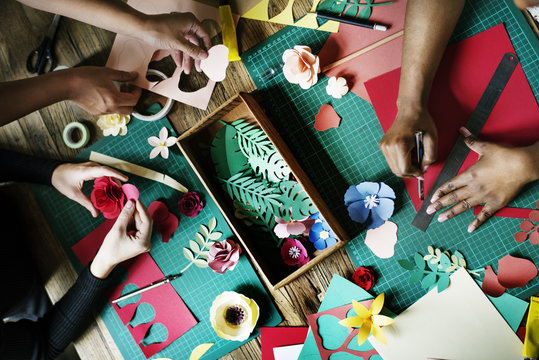 People Making Paper Flowers Craft Art Work Handicraft