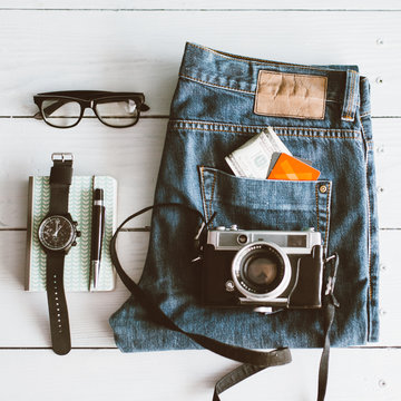 Man's jeans and various personal items