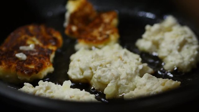 Frying Cottage Cheese Pancakes In A Frying Pan