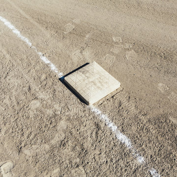 Baseball base and dirt field