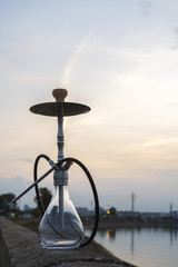 Metallic shisha in the sunset background