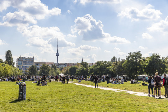 People enjoy sunny Sunday at Mauerpark in Berlin