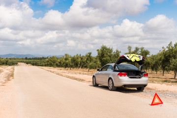 The Spanish landscape. The car broke down on the road. Copy space for text.