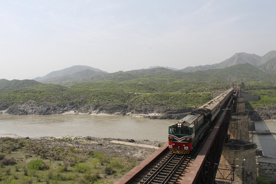 Train , crossing mighty river Indus !