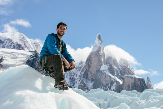 Young man on a glacier in Patagonia - Cerro Torre, Chalten, Argentina