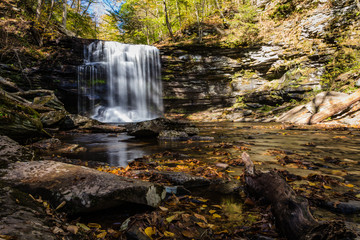 Waterfalls are surrounded by colorful fall foliage at Ricketts Glen State Park in Benton, PA