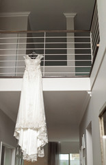 Fototapeta na wymiar Beautiful wedding dress hanging