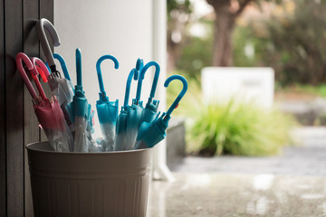Umbrellas in a bucket