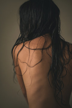 Portrait of a young naked woman.
