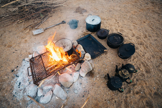 Outdoor camp fire cooking in the desert