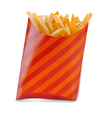 Paper bag with yummy french fries on white background