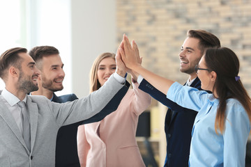 Team of young marketing managers in office © Africa Studio