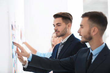 Young handsome men in office © Africa Studio