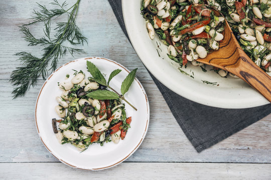 Food: Herbed Salad with haricot beans, tomatos and olives with dill and mint