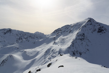 Fototapeta na wymiar Mountain panorama with snow and blue sky in winter in Stubai Alps, Austria