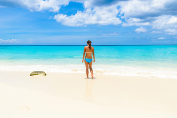 Fototapeta na wymiar Girl at Grote Knip beach, Curacao, Netherlands Antilles - paradise beach on tropical caribbean island