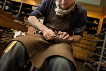 Young Shoemaker at Work