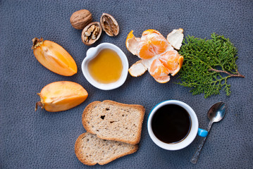 Healthy breakfast with toast, honey and black coffee. Food background.