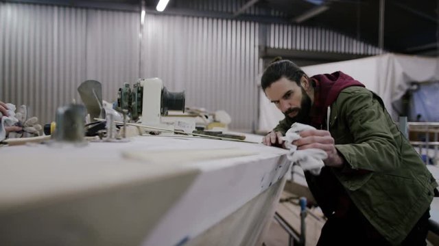  Father & son in boatyard building & renovating sailing boats, family business