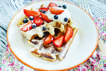 waffles with fresh berries and cream