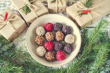 Homemade chocolate truffles on a christmas background