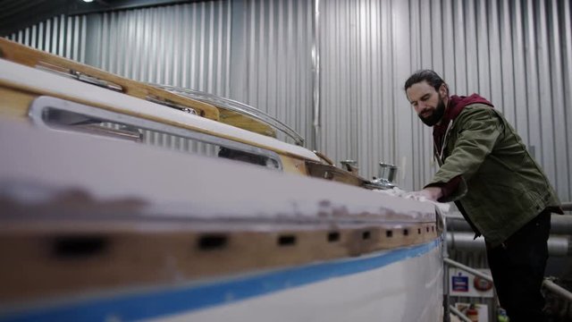  Father & son in boatyard building & renovating sailing boats, family business