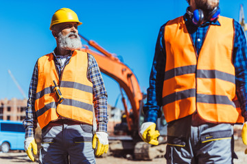 Fototapeta premium workers at construction site