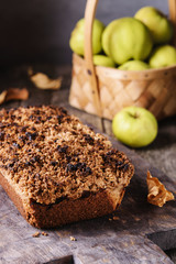 Homemade oatmeal apple cake crumbs on top on vintage rustic wooden background. Flourless, healthy dessert. Thanksgiving Day's treat dessert. Selective focus  